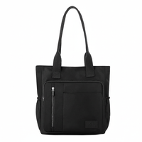 Black tote bag with CHANCE logo
